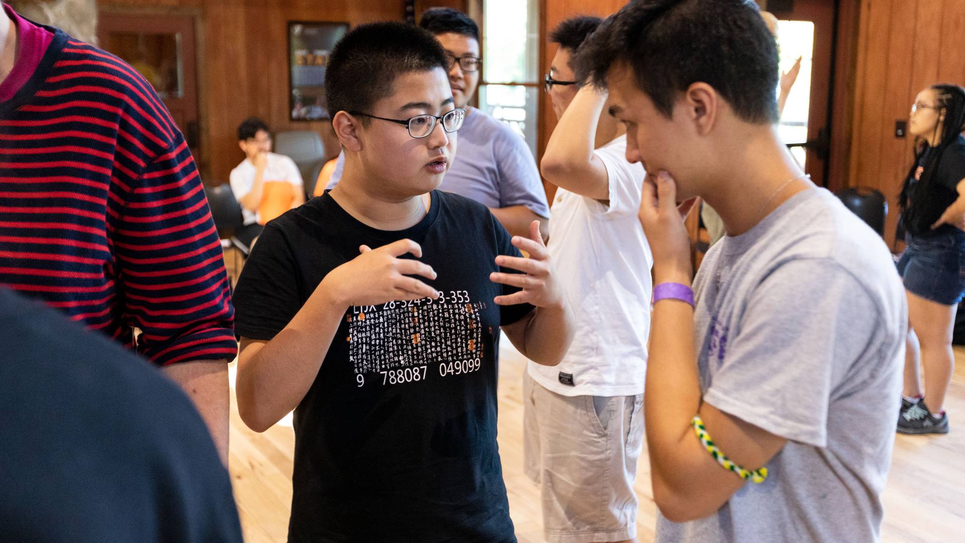 Hanzhang Ren (left) speaking with Hunter Worth