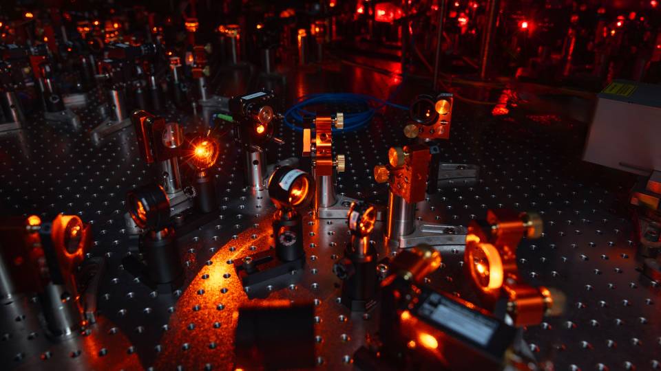 A table full of glowing lasers