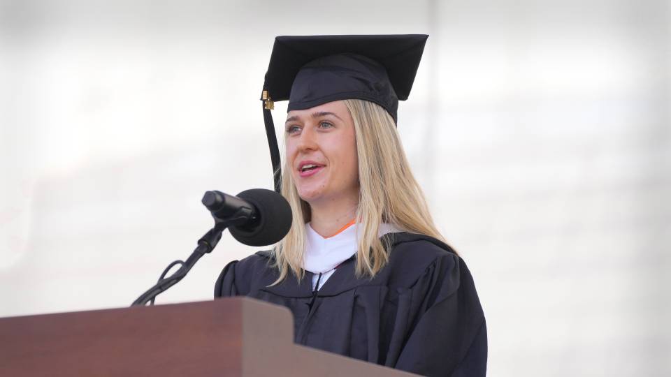 Genrietta Churbanova behind podium