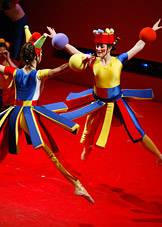 Two dancers leaping
