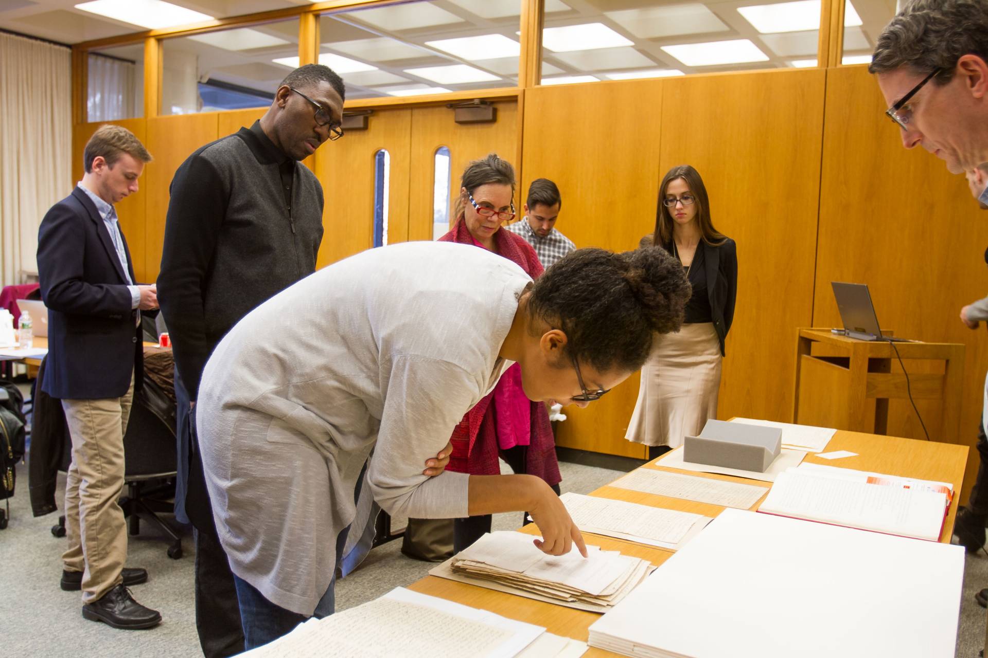 Playwrights examining archival documents