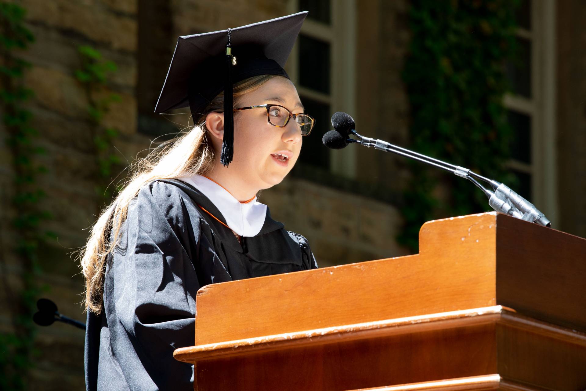 Valedictorian Kate Reed gives her address at the podium