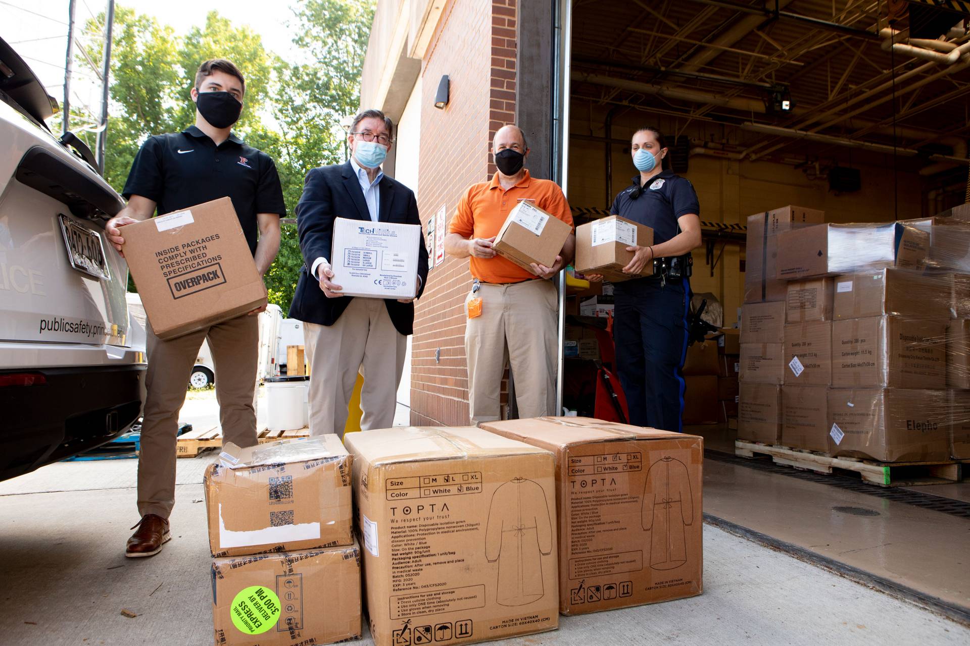 members of EHS and UHS giving a donation of PPE to Mercer County Executive Brian Hughes