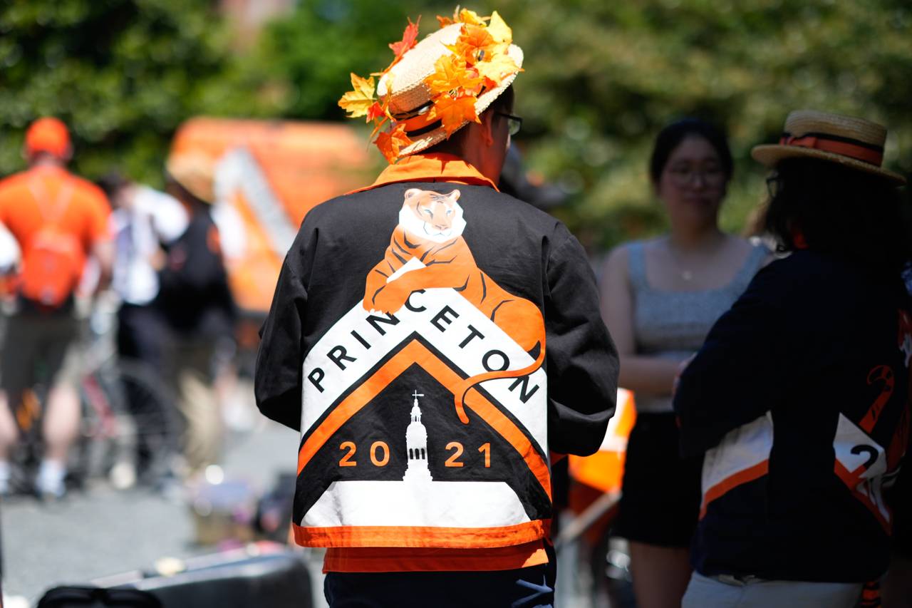 Alumi walking wearing the Class of 2021 jacket.